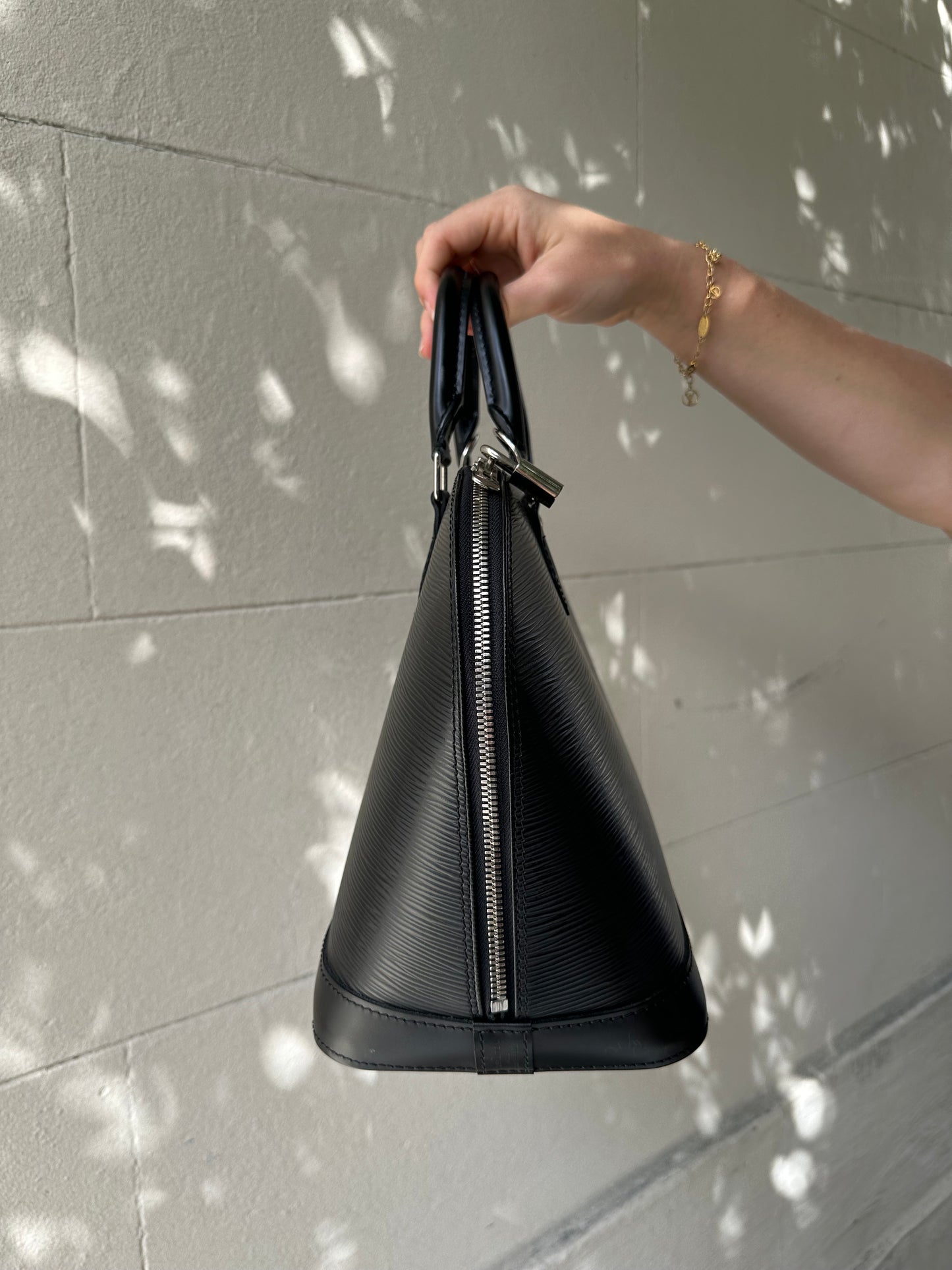 Louis Vuitton Black Epi Alma Bag