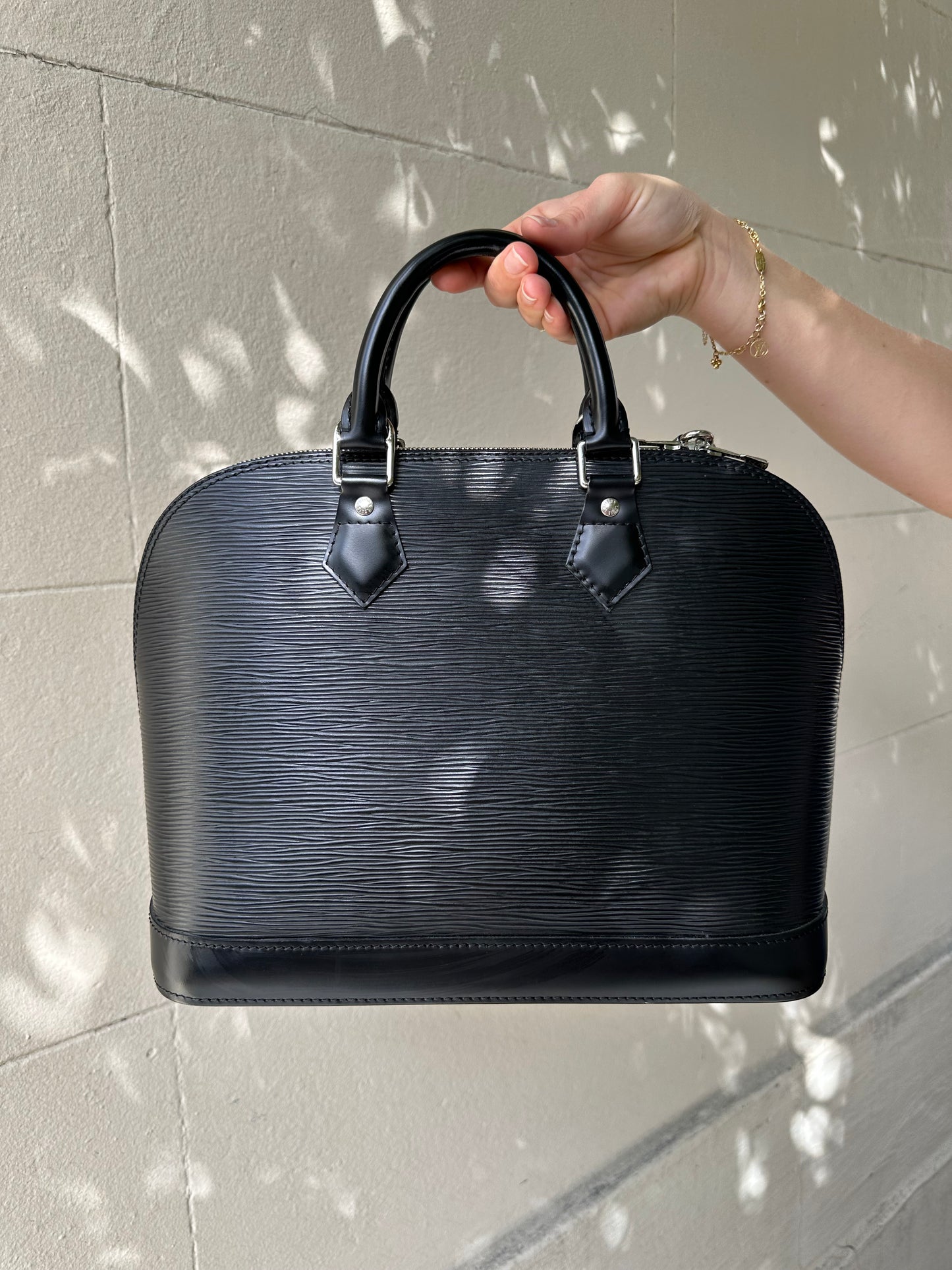Louis Vuitton Black Epi Alma Bag