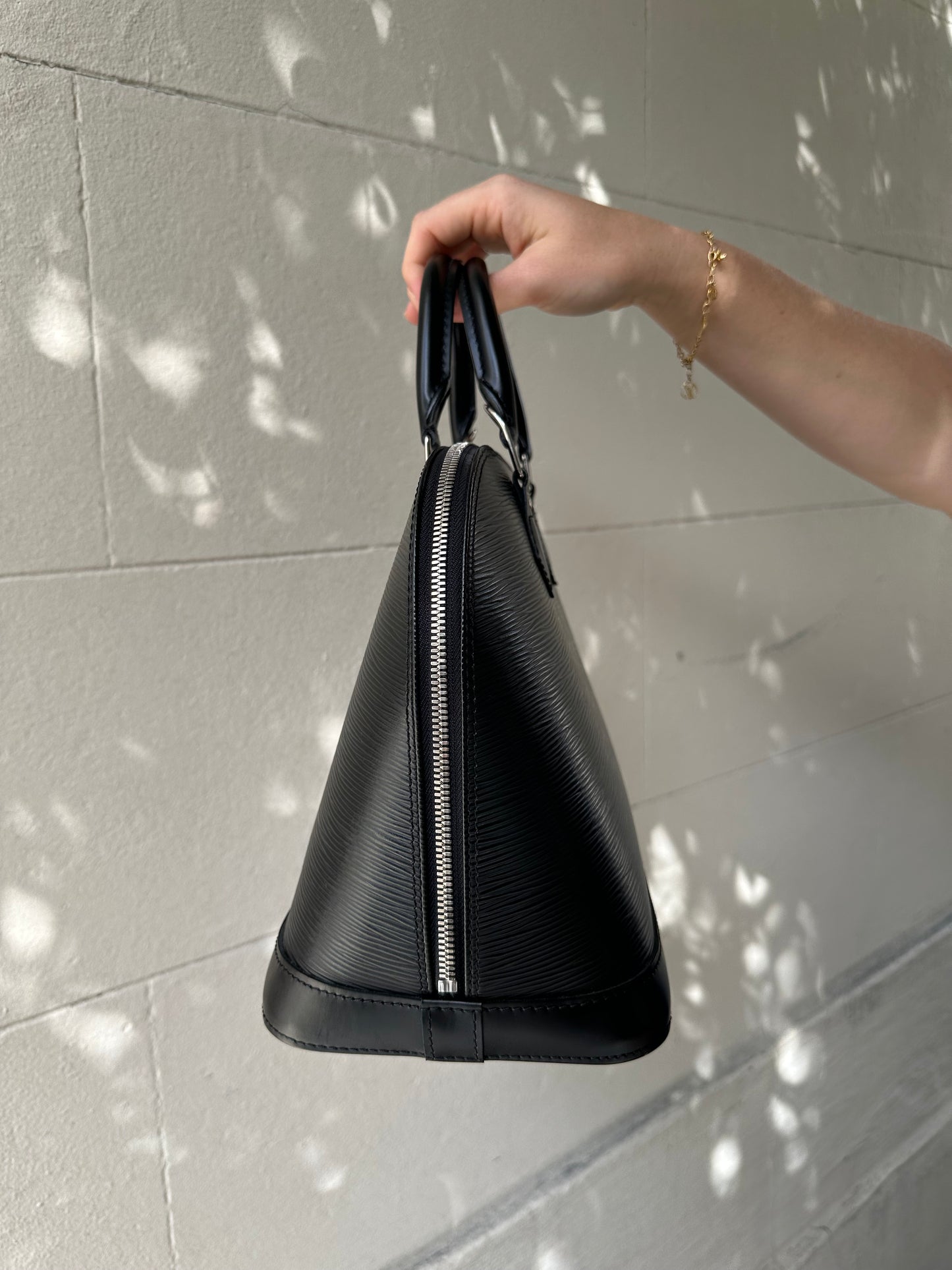 Louis Vuitton Black Epi Alma Bag