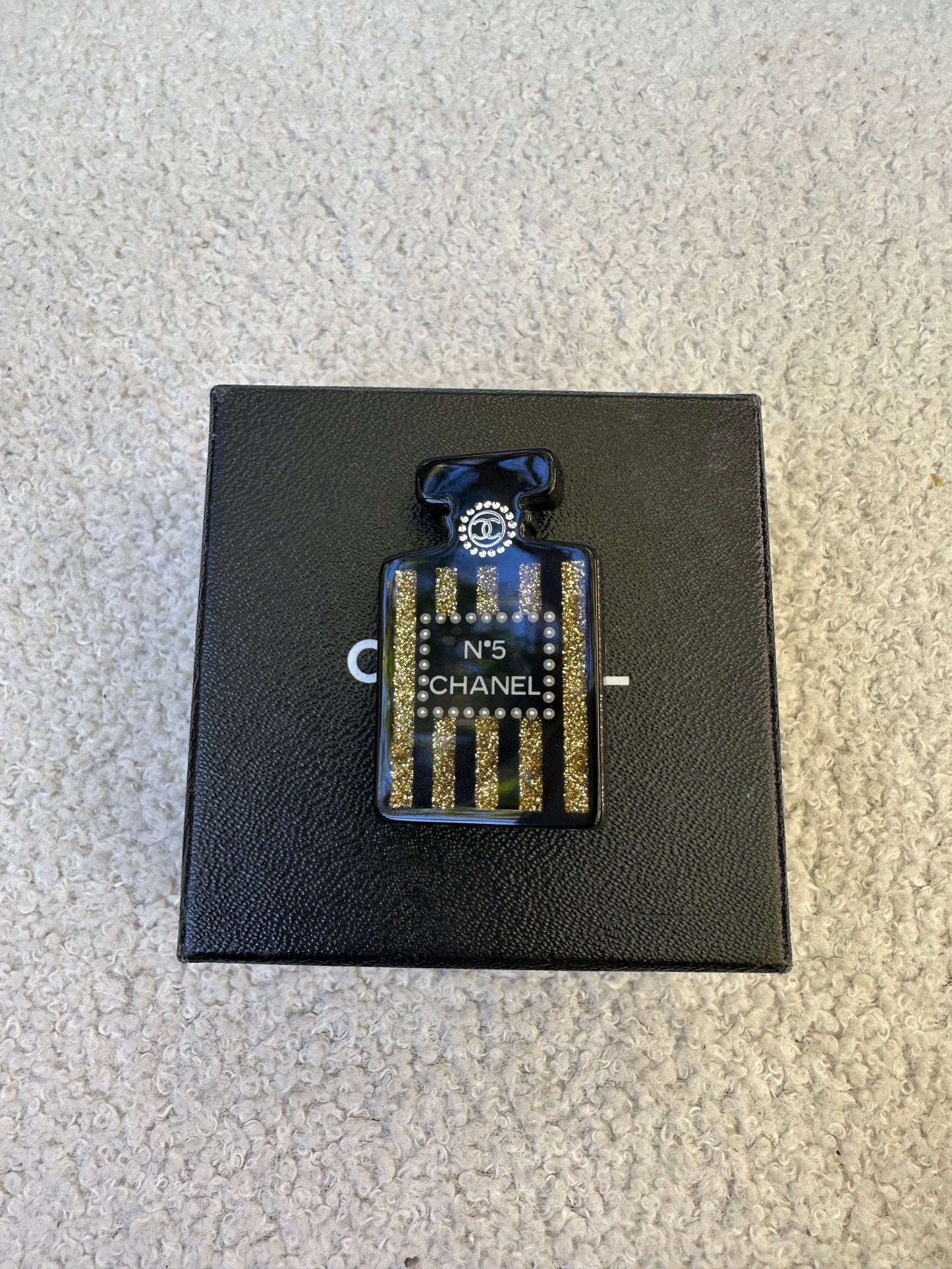 Chanel No.5 Black and Gold Brooch
