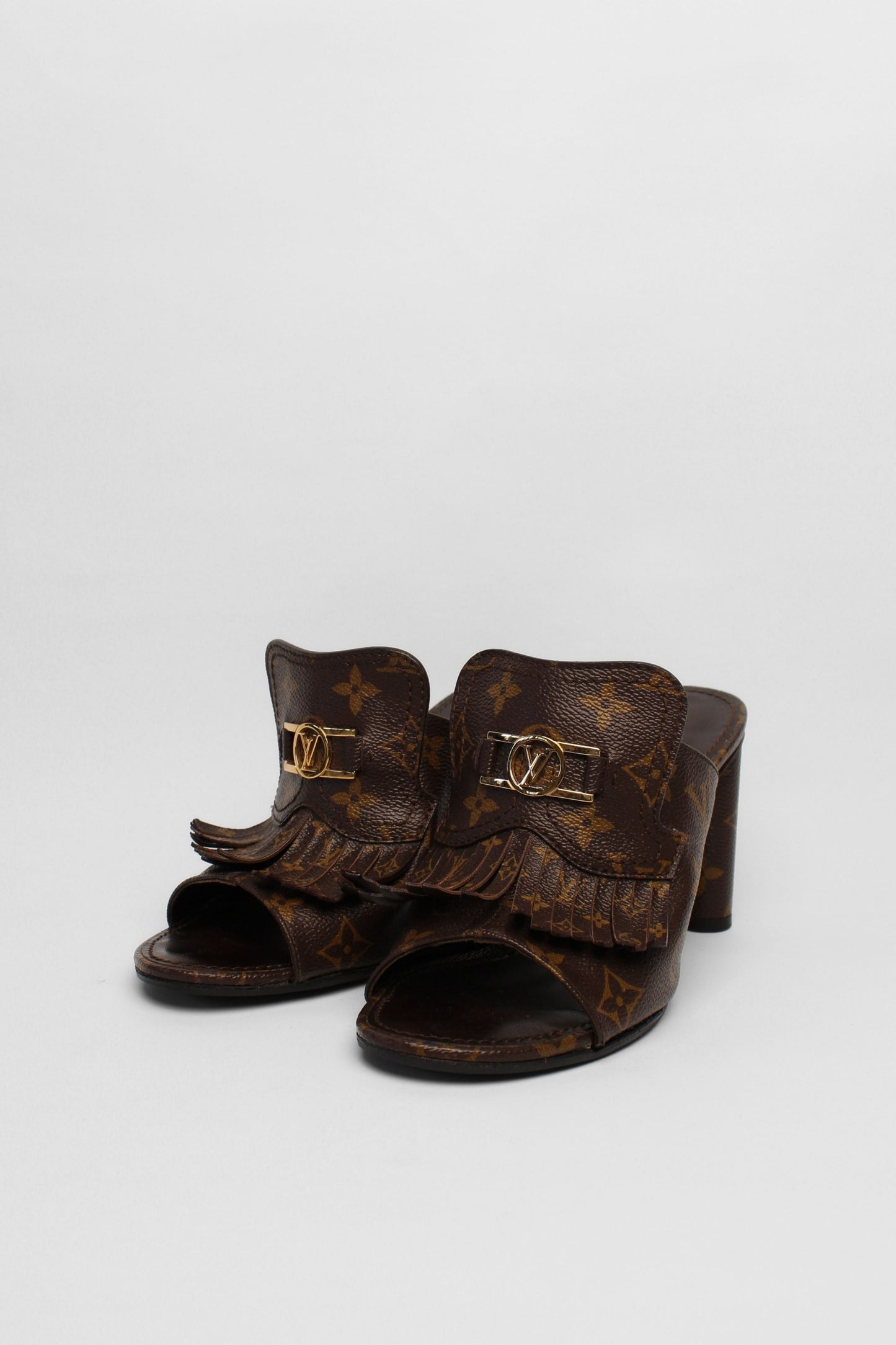 Louis Vuitton Monogram Indiana Fringe Mules Size 39