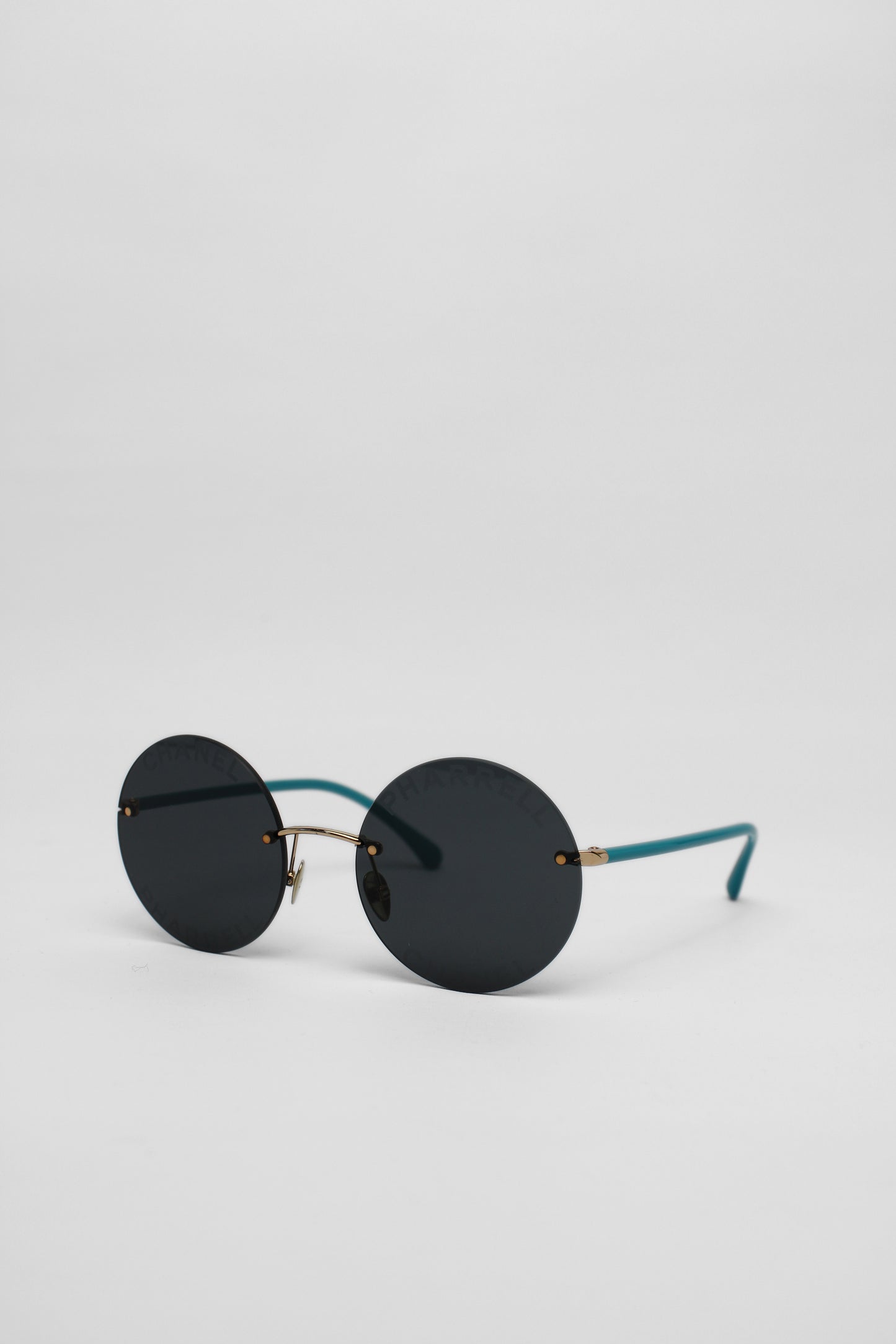 Chanel / Pharell collaboration round sunglasses acqua arms
