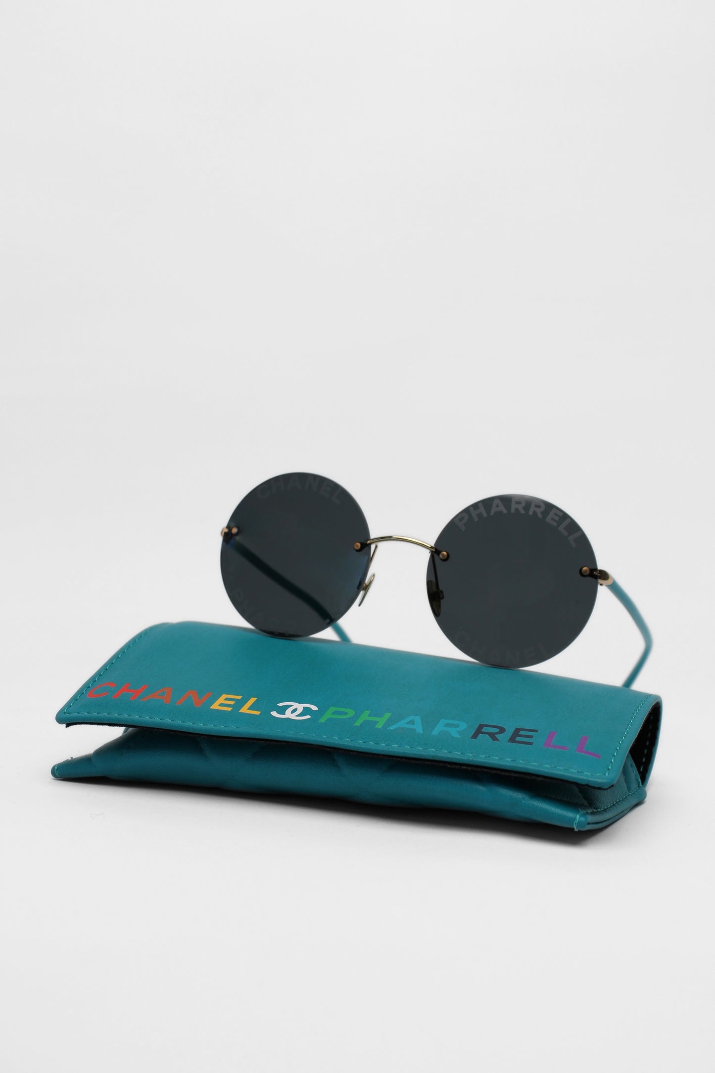 Chanel / Pharell collaboration round sunglasses acqua arms