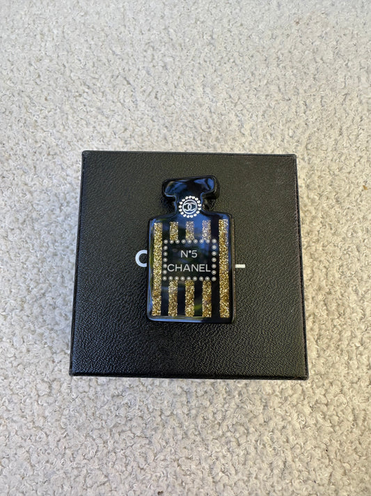 Chanel No.5 Black and Gold Brooch