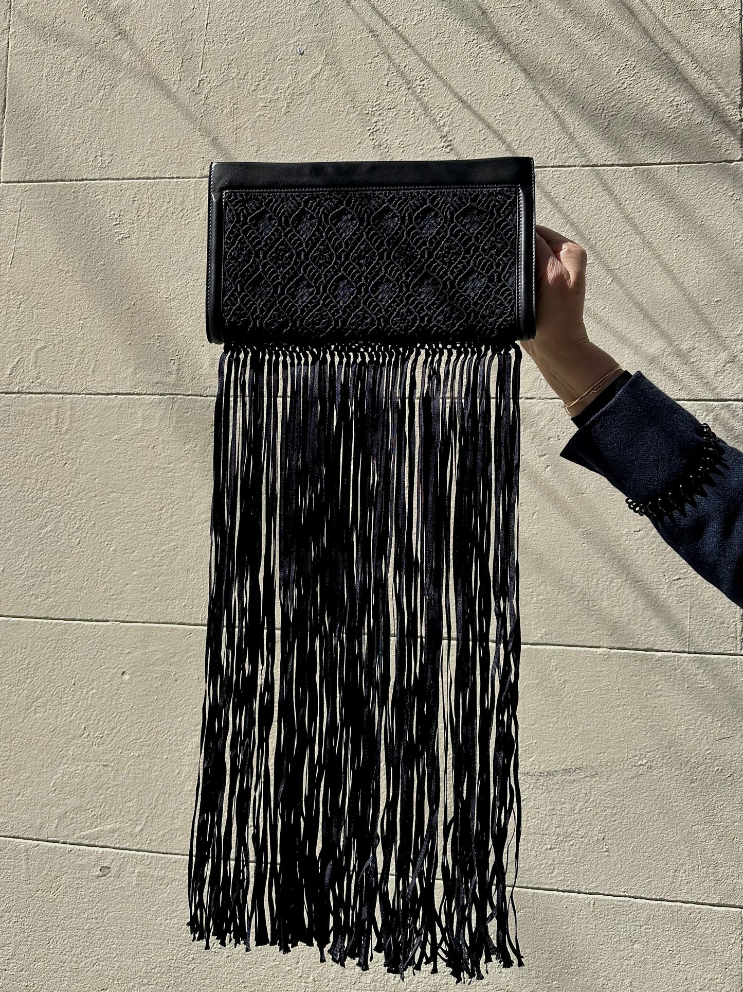 The Row Black Fringe Clutch Bag